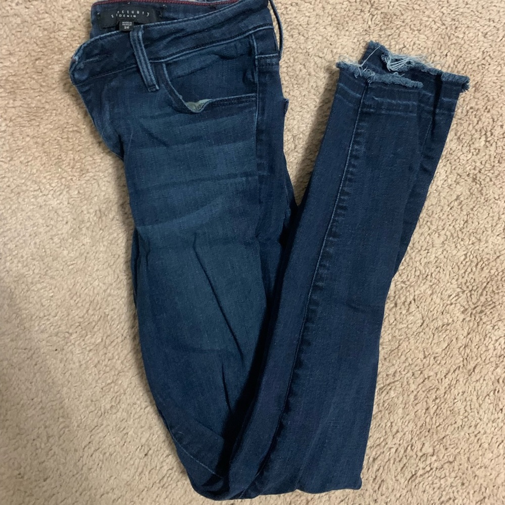 Sanctuary denim skinny jeans with frayed bottoms